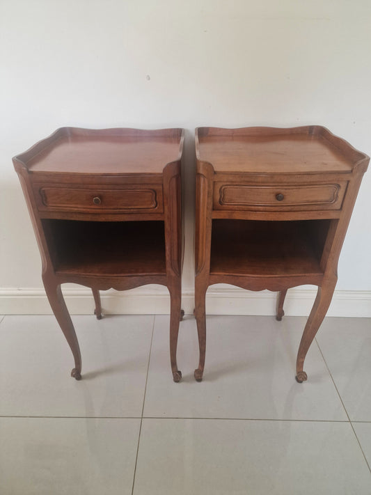 Pair of classic single drawer antique French wooden bedside tables