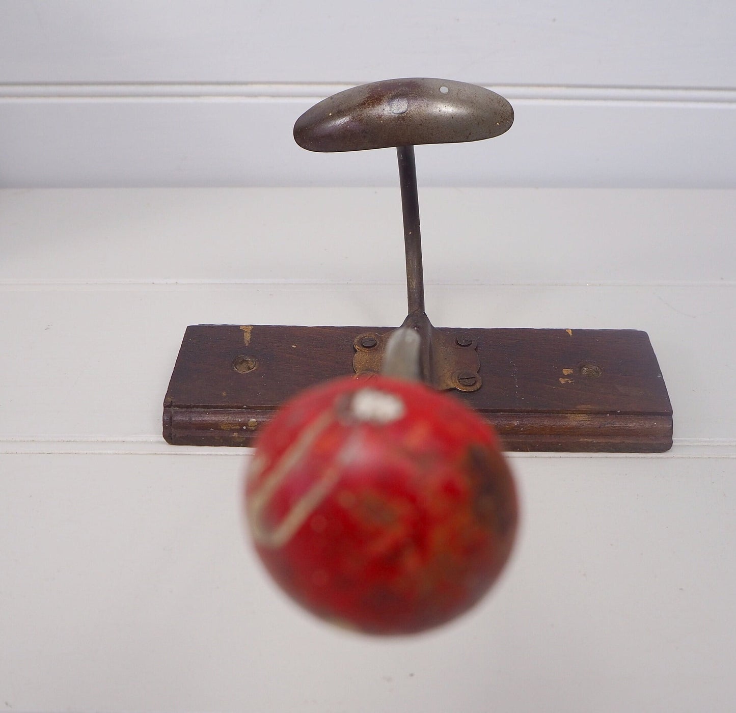 Vintage French red wood and metal compact retro single peg coat hook