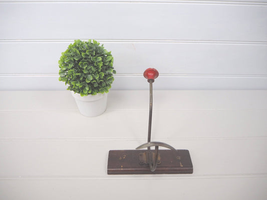 Vintage French red wood and metal compact retro single peg coat hook