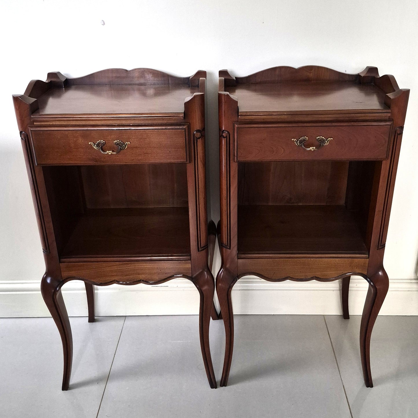 Pair vintage French dark wood bedside tables with a single drawer and space below