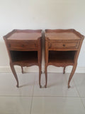 Pair of classic single drawer antique French wooden bedside tables