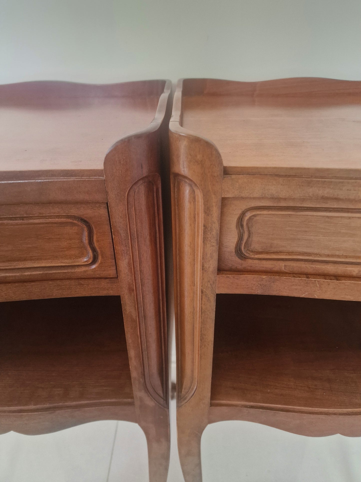Pair of classic single drawer antique French wooden bedside tables