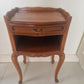 Pair of Monsieur et Madame antique French wooden bedside tables