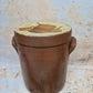 Vintage French tall lidded confit jar with onion design decorated lid